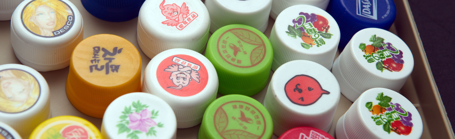 Printed caps and closures by Desco Machine Company